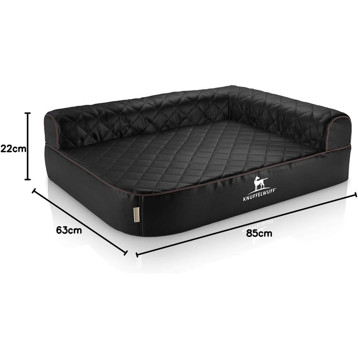 Ортопедичне кутове ліжко для собак Knuffelwuff Winslow з чорного лазерно-прошитого штучного шкіряного покриття, розмір L 85 x 63 см, збірна спинка, знімний чохол, легко миється, підходить для великих, середніх та малих собак. Розміри: 85 x 63 x 22 см.