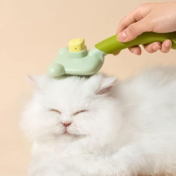 Самоочищувана щітка для вичісування шерсті у формі ведмедика. Покращує кровообіг, легко чиститься. Підходить для всіх типів шерсті котів та собак з довгою шерстю (фіолетовий)